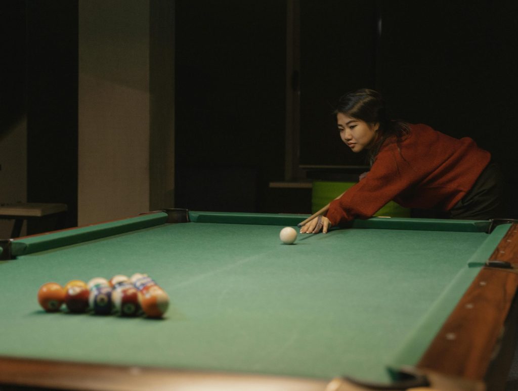 woman-ready-to-break-pool-rack